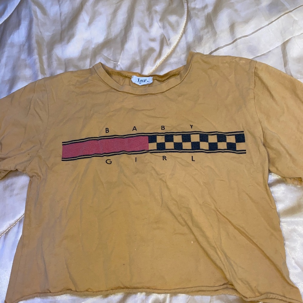Cropped “babygirl” gold and black shirt